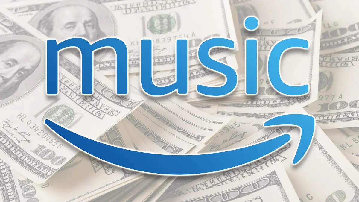 El logotipo de Amazon Music sobre una pila de dinero en efectivo.
